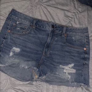 Frayed distressed medium wash shorts